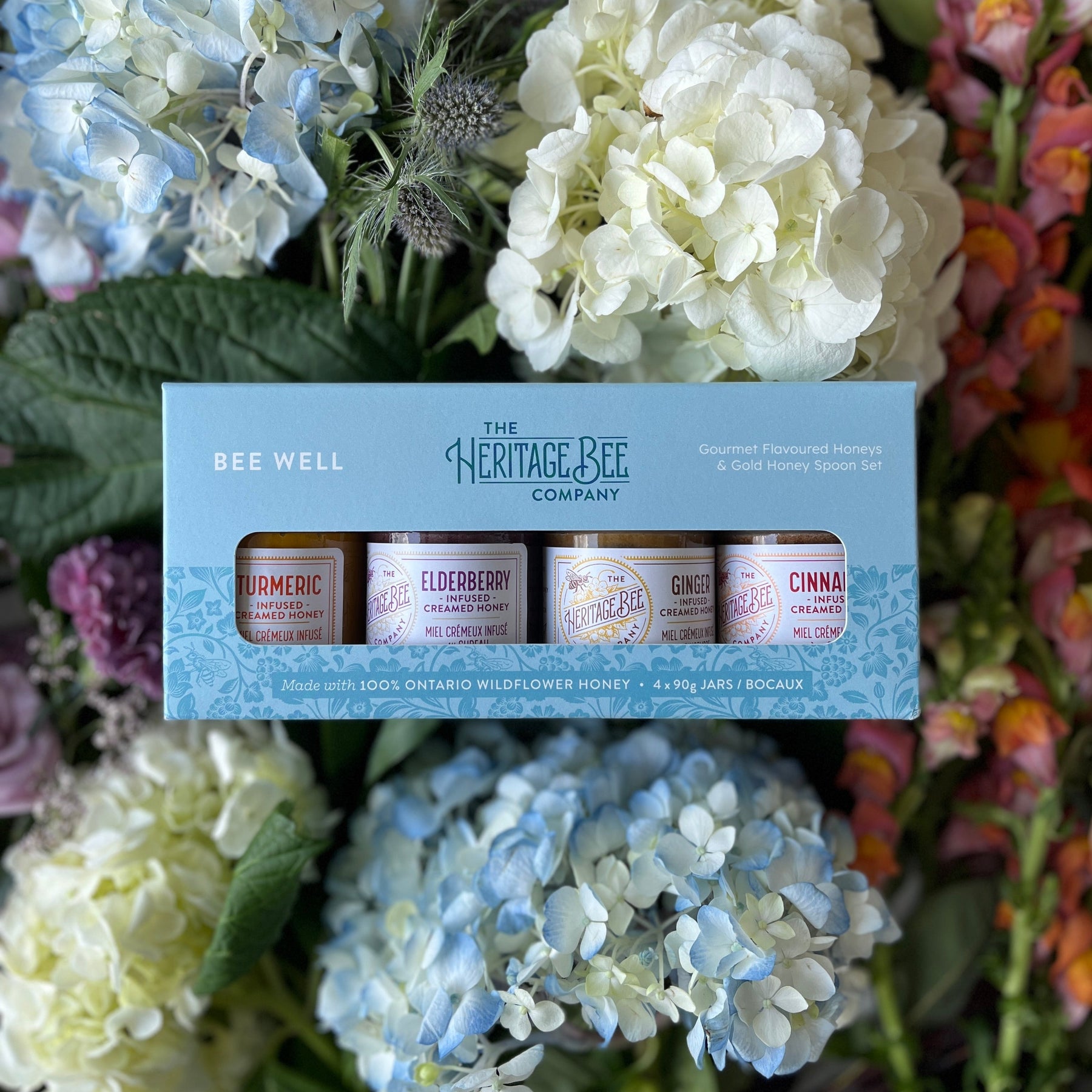 Bee Well Gourmet Honey Gift Set. From Heritage Bee Co. Included is a gold honey spoon with each set