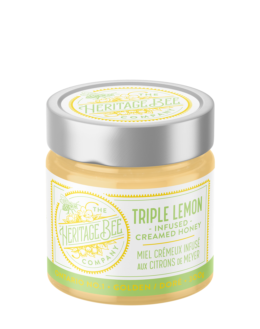 Heritage Bee Co premium Ontario creamed honey infused with premium lemon oil, freshly squeezed organic Meyer lemon, and organic Meyer lemon zest. Gourmet unpasteurized honey handcrafted by expert beekeepers.