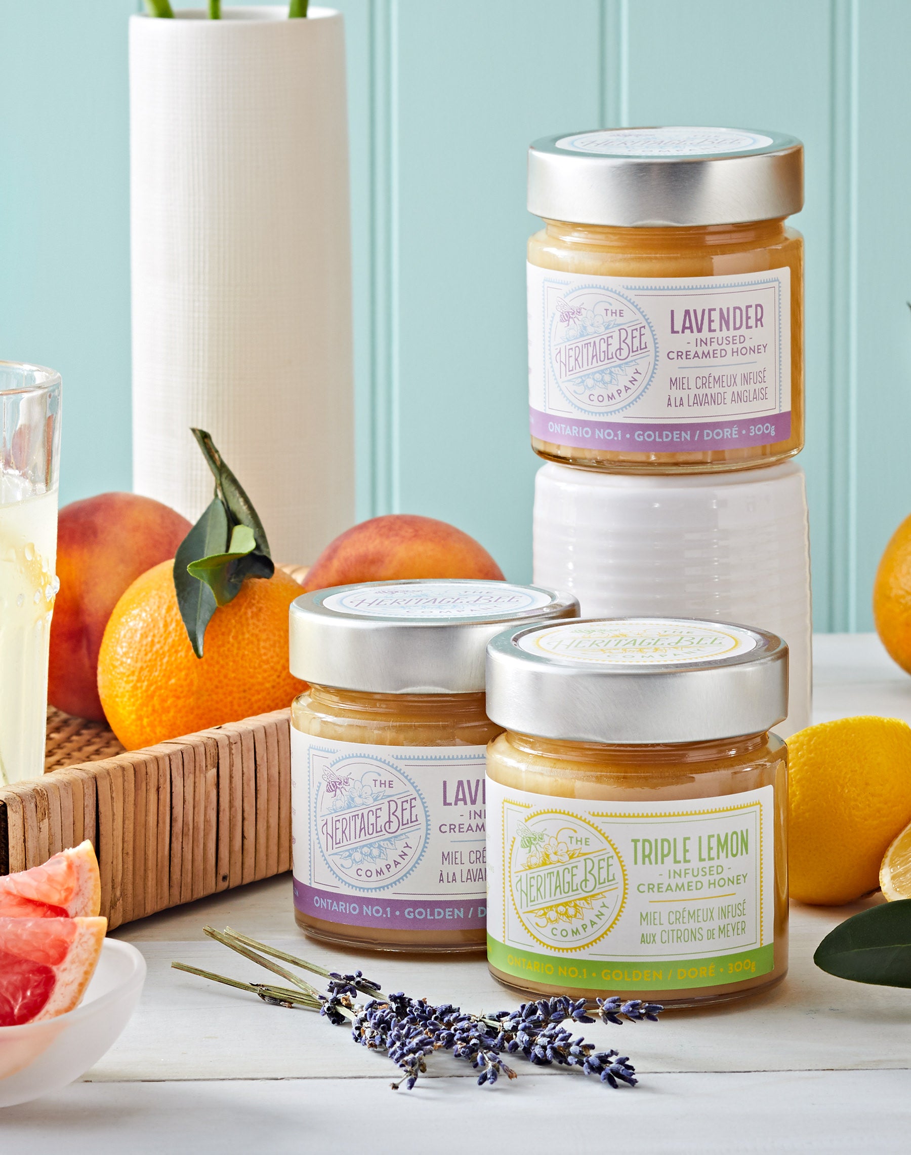 Heritage Bee Co's Lavender creamed honey pictured alongside Heritage Bee Co's Triple lemon creamed honey.